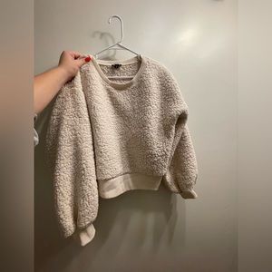 beige fluffy long sleeve crewneck size medium